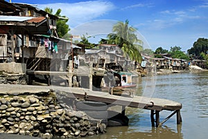 Asian slums on river bank