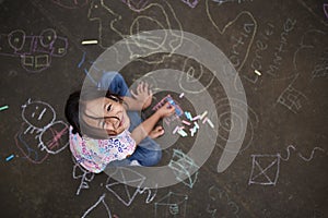 Asian small girl with chalk