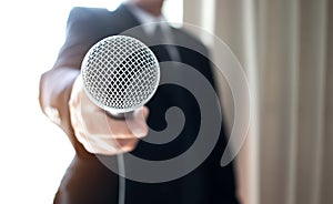 Asian Smart businessman speech and speaking with microphones in