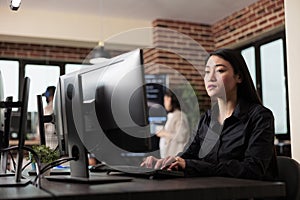 Asian software developer engineering security algorithm using visual programming
