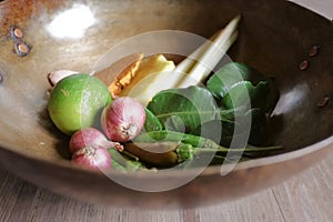 Asian spices on brass bowl