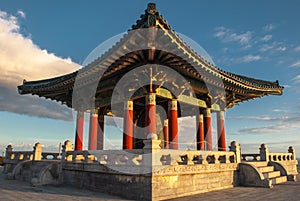 Asian stone structure in park with stairs