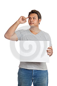 Asian strong man show a blank sign think of something