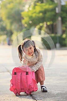 Asian student playing afer back to home with happiness emotion