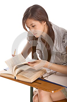 Asian student preparing for spelling-bee contest photo