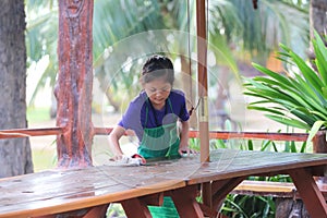 Asian Students ,Children working in the restaurant during the summer, Child labor was cleaning in the restaurant