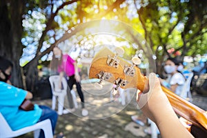 Asian students studying music Musical instruments as ukulele