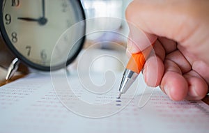 Asian Students taking optical form of standardized exams near Al