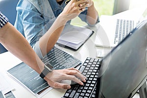 Asian team Outsource Developer Looking Screen Programming Code W