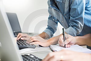 Asian team Outsource Developer Looking Screen Programming Code W
