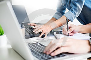 Asian team Outsource Developer Looking Screen Programming Code Working with Laptop Computer Software