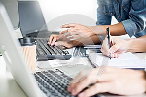 Asian team Outsource Developer Looking Screen Programming Code Working with Laptop Computer Software