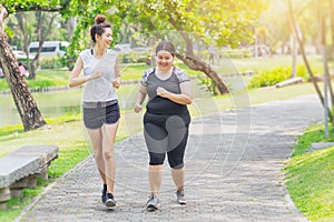 Asian teen running fat and thin friendship jogging