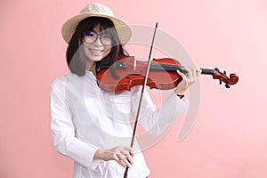 Asian teen with violin glasses hat smile