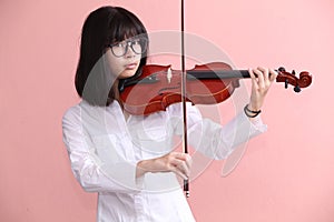 Asian teen with violin glasses smile