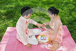 Asian Thai Bridal Wearing Wedding Ring