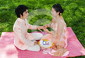 Asian Thai Bridal Wearing Wedding Ring