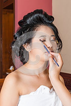 Asian Thai Girl Getting Eye Shadow on Eyelids