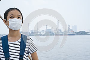 Asian thai girl wearing protective mask or hygienic mask in smog day