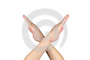 Asian Thai males raises up his arms hands hand finger and isolated post cross together on the white background photo