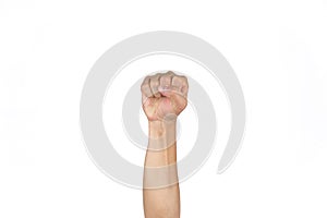 Asian Thai males tense fist and rise the isolated hand on the clear white background