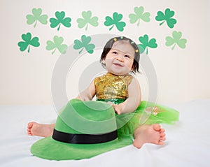 Asian Thai Sweet Baby Girl in Green Dress, Saint Patrick`s Day