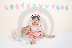 Asian Thai Sweet Baby Girl in Pink Dress, Easter Day
