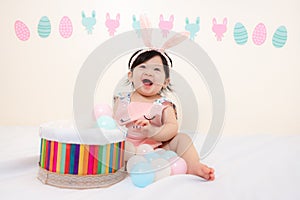 Asian Thai Sweet Baby Girl in Pink Dress, Easter Day