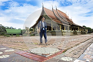 Asian thai woman people praying buddha and travel at Wat phu prao at Sirindhorn District in Ubon Ratchathani, Thailand