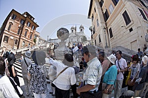 Asian tourists at Piazza Spagna in Rome, Italy.