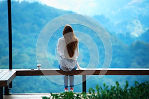 Asian tourists woman on view point at Tea garden doi angkhang T