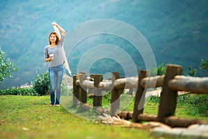 Asian tourists woman on view point at Tea garden doi angkhang T