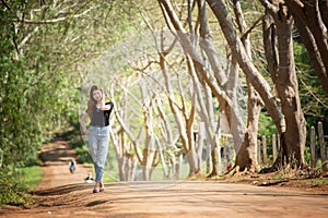 Asian tourists woman on view point at Tea garden doi angkhang T