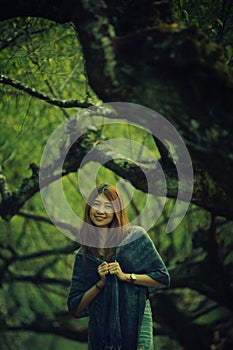 Asian tourists woman on view point at Tea garden doi angkhang T