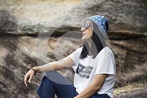 Asian travelers thai women travel and posing at Sao Chaliang in Pha Taem National Park