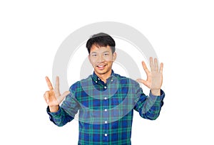 An Asian untidy man in blue plaid shirt is showing number eight symbol by his fingers