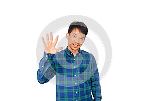 An Asian untidy man in blue plaid shirt is showing number five symbol by his fingers