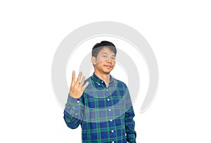 An Asian untidy man in blue plaid shirt is showing number four symbol by his fingers