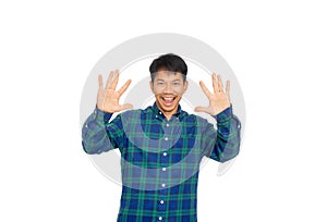 An Asian untidy man in blue plaid shirt is showing number ten symbol by his fingers