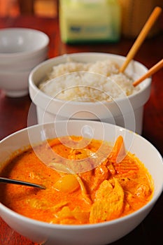 Asian vietnamese chicken curri soup with white rice photo