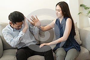 Asian wife does not understand the husband explanation about the mental health problems that have occurred with his wife and photo