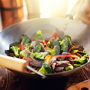Asian wok with beef and vegetable stir fry photo