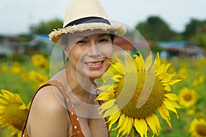 Asian Woman 40s LGBT transgender express feeling Happy Smile fun under sunshine in Sunflower yellow
