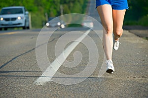 Asian woman active in forest. running.