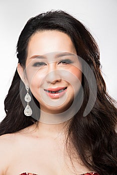 Asian Woman after applying make up hair style