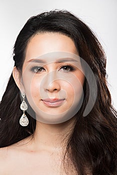 Asian Woman after applying make up hair style