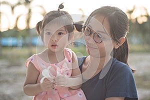 Asian woman and Asian child happiness together.