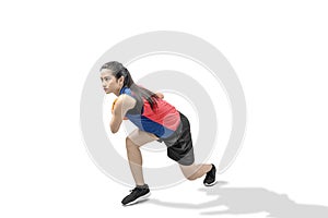 Asian woman basketball player in action with the ball