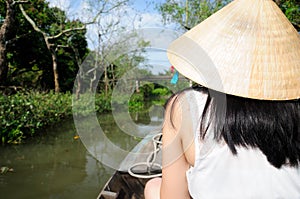 Asian woman in a boat in Vietnam