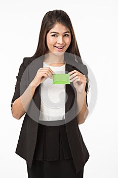 Asian Woman in business formal black suit holding a green blank name card